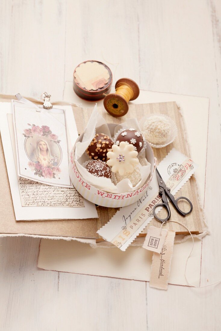Petits fours in a box with nostalgic writing materials