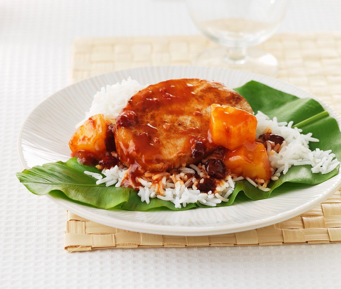Sweet and sour pork with pineapple on a bed of rice