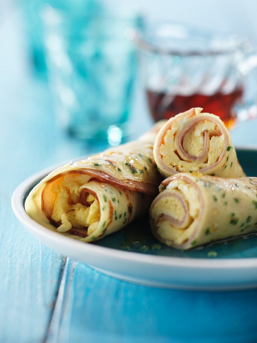 Savoury chive pancakes filled with scrambled egg and ham