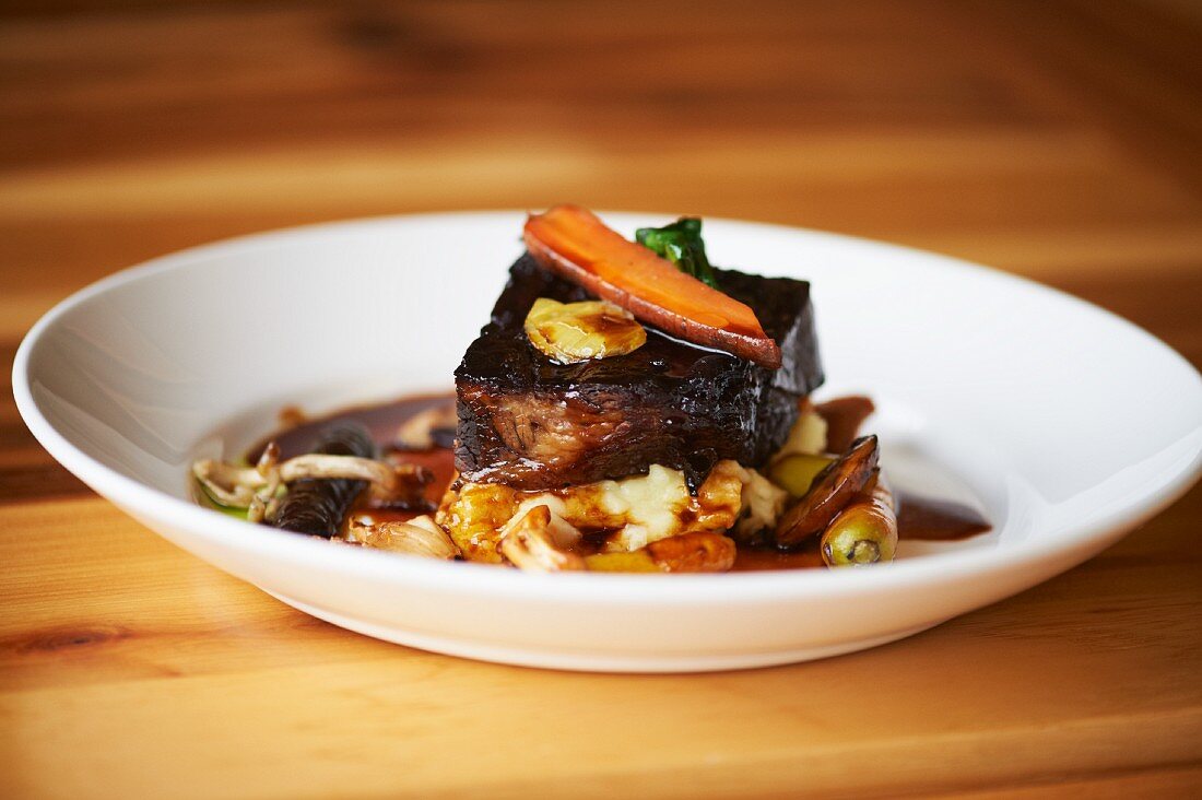 Red Wine Braised Beef Short Ribs with Whipped Parsnips and Winter Vegetable Ragout
