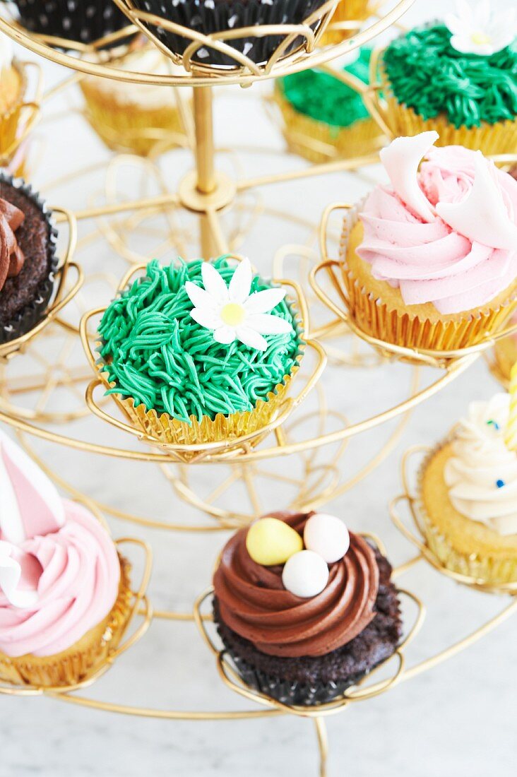 Assorted Spring Cupcakes on a Gold Wire Cupcake Holder