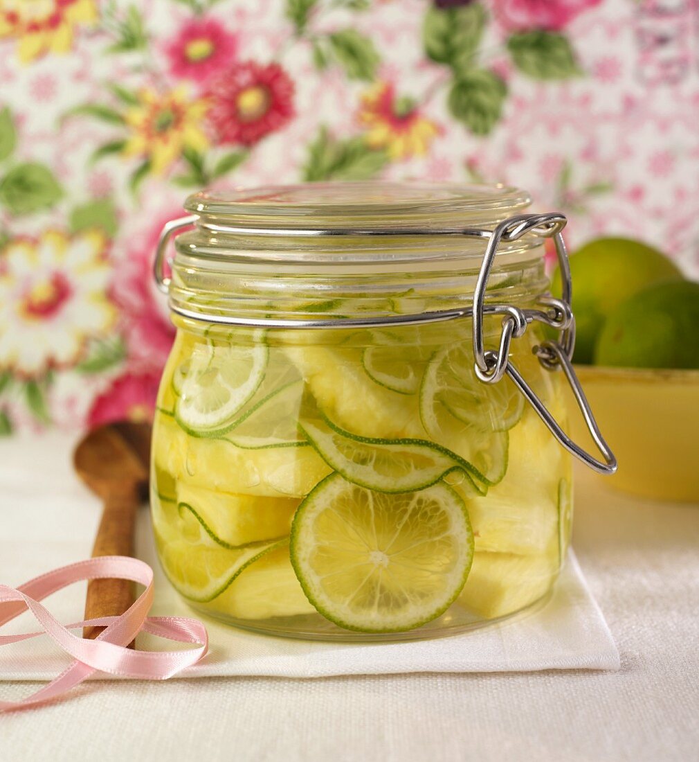 Pineapple and limes preserved in rum and sugar