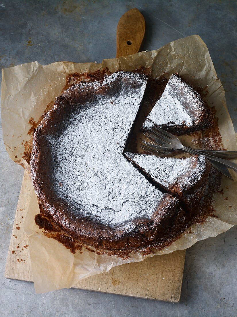 Piece of Midnight Chocolate Sheet Cake with Powdered Sugar