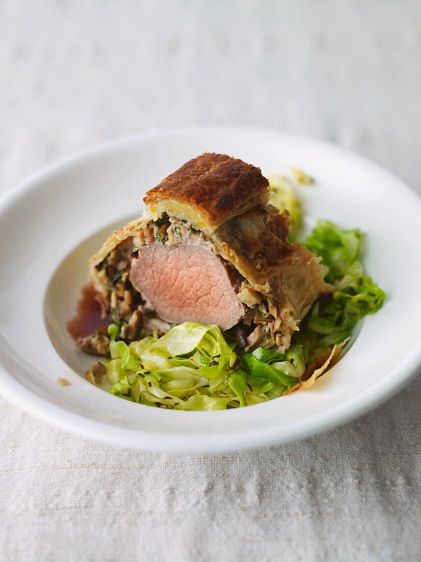 Beef Wellington with cabbage