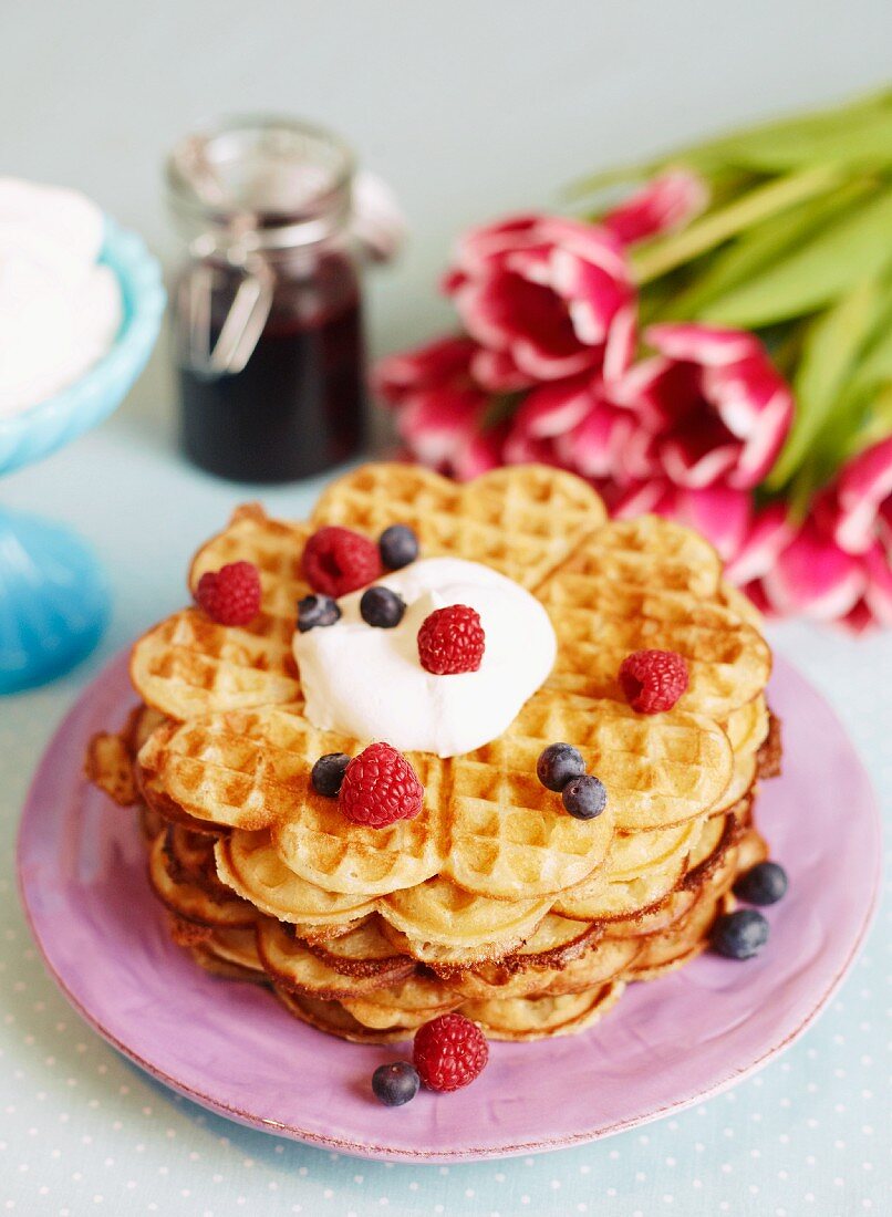 Waffles with cream and berries