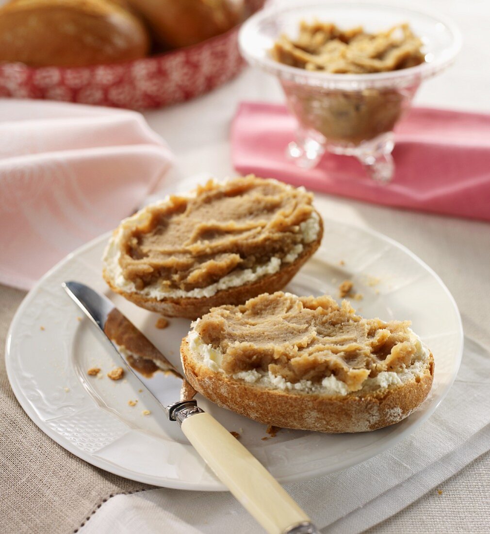 A bread roll spread with sweet chestnut paste