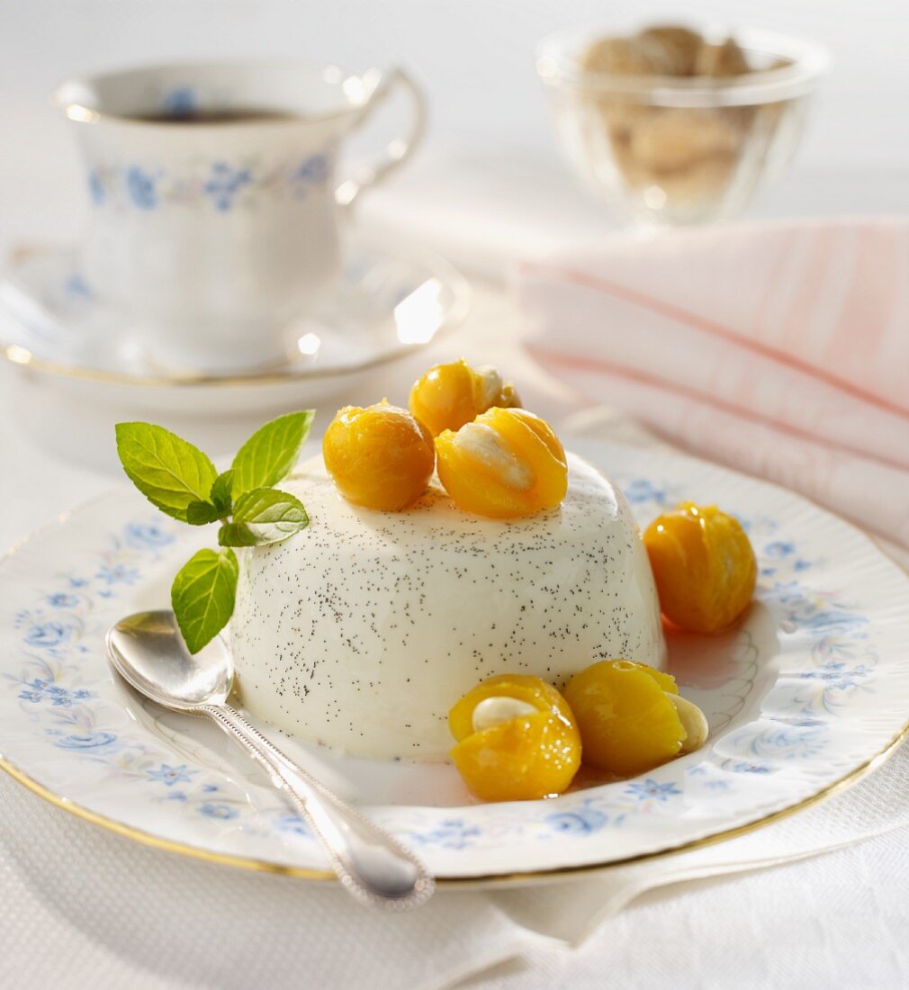 Panna cotta with almond-stuffed mirabelle plums