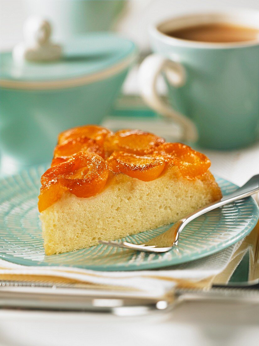 A slice of apricot upside-down cake