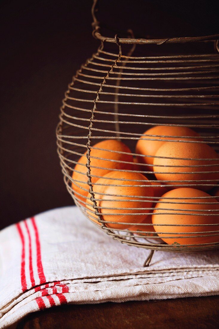 Brown Eggs in a Wire Basket