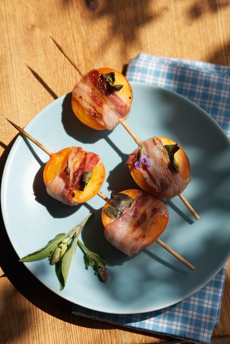Barbecued apricots wrapped in bacon