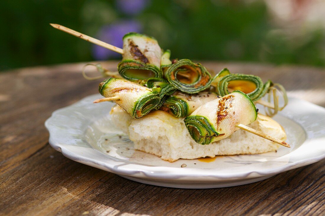 Grilled rolled courgette slices on focaccia