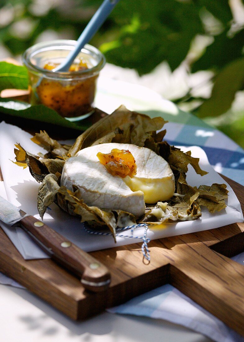 Camembert in a vine leaf, with chutney