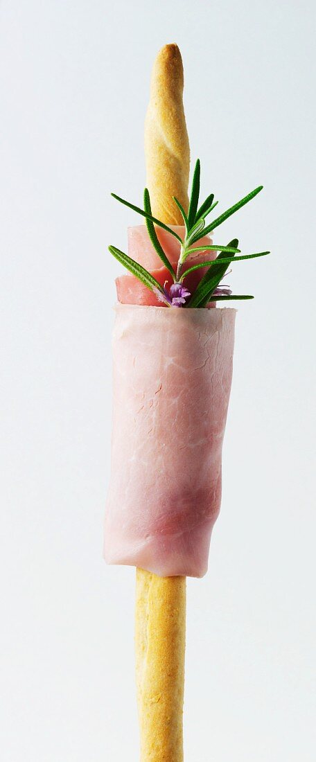 Grissini with ham and rosemary