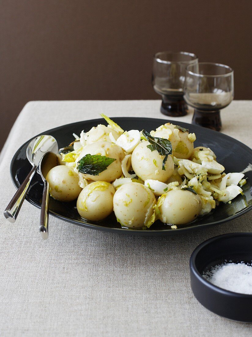 Potato salad with quail's eggs and mint