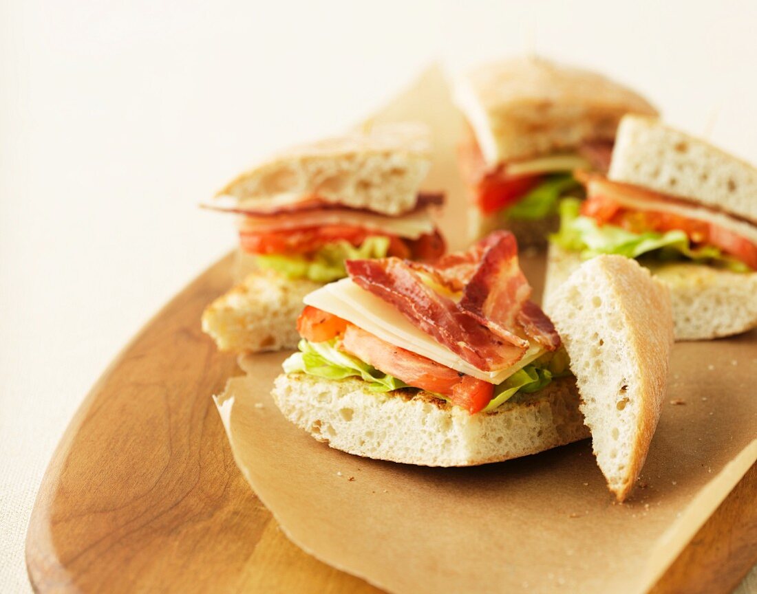 BLT sandwiches on grease-proof paper