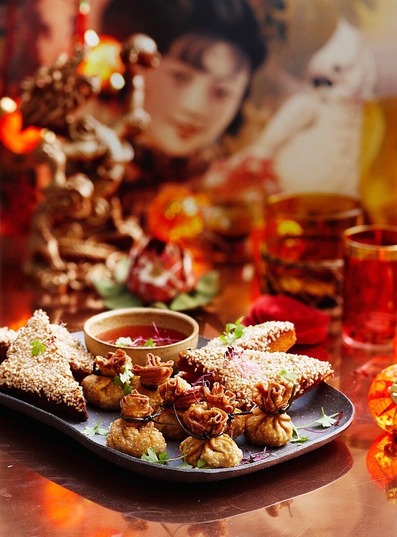 Fried pastry parcels and prawn and salmon toast