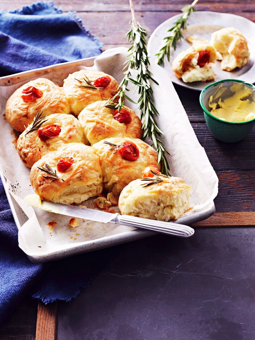 Australian rolls with cheese, cherry tomatoes and rosemary