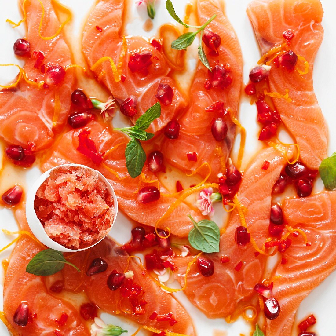 Salmon sashimi with pomegranate seeds and blood orange granita for Easter