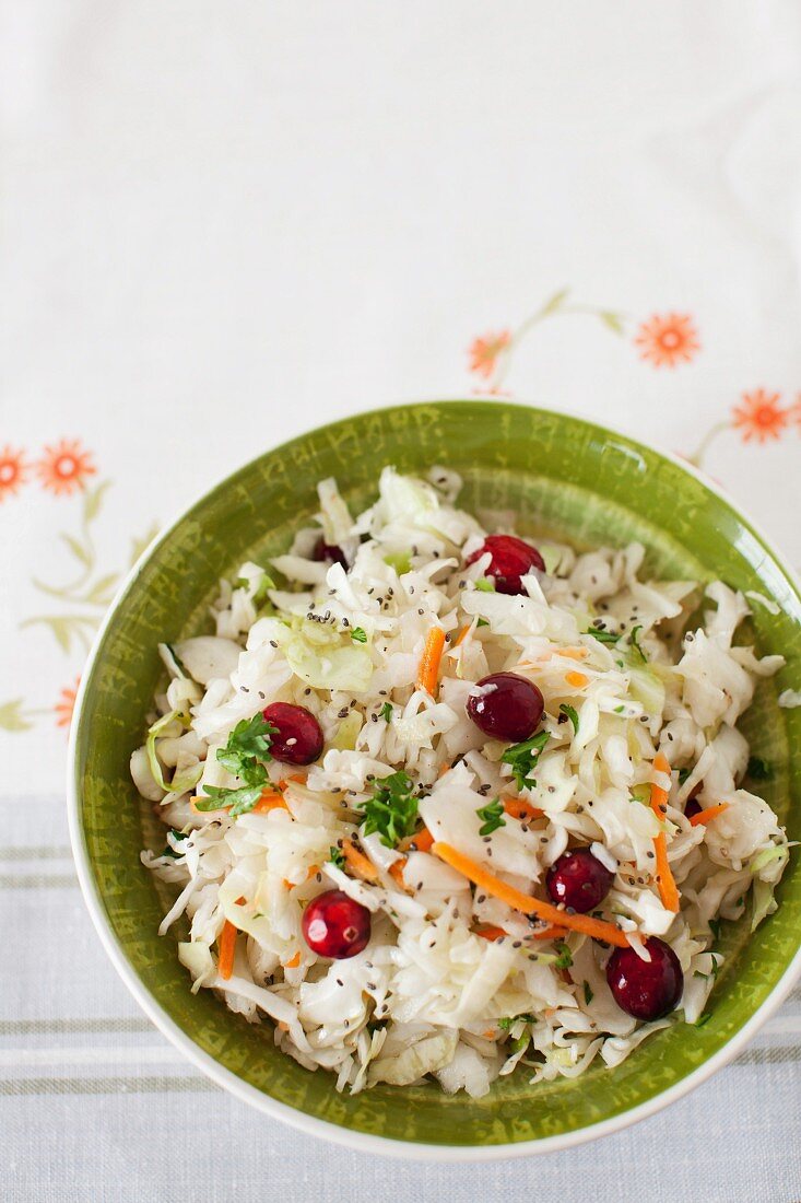 Cole Slaw with Cranberries in a Green Bowl