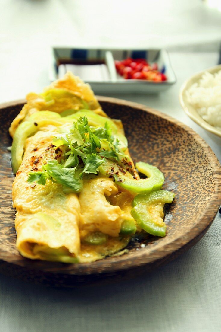 An omelette with bitter melon and coriander