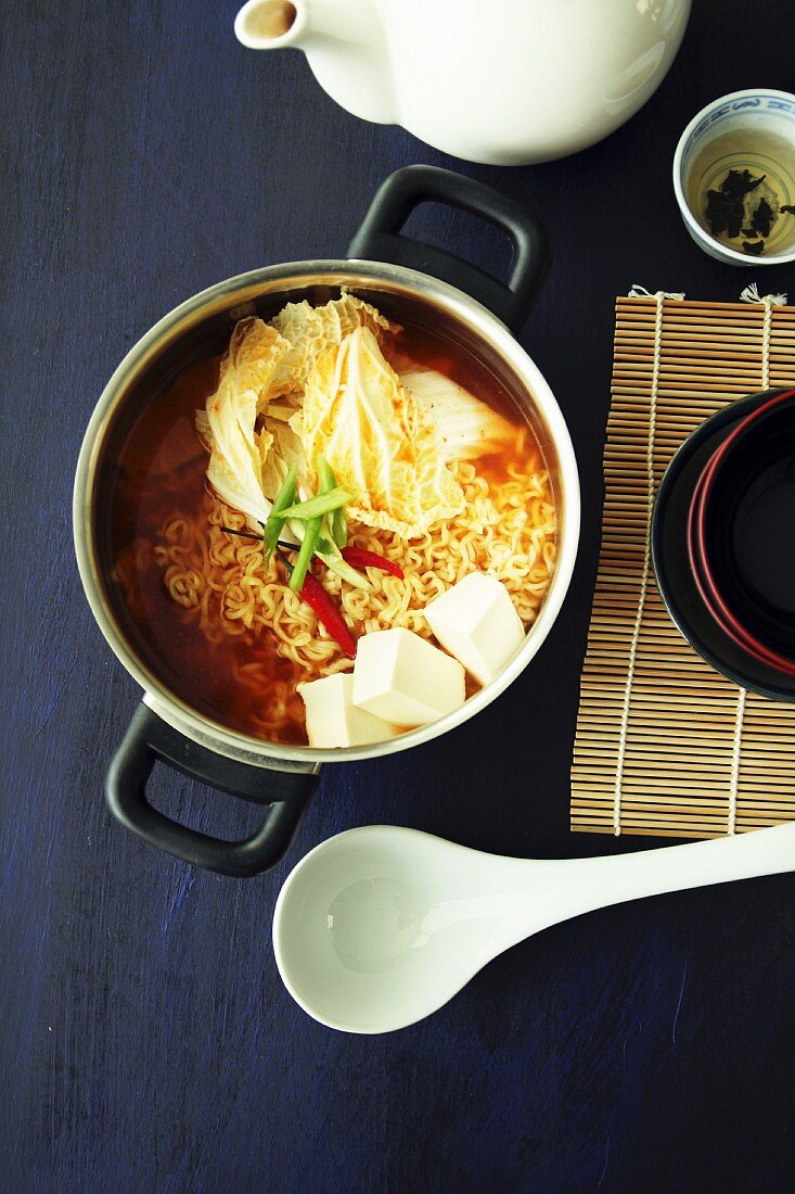Soup with kimchi noodles