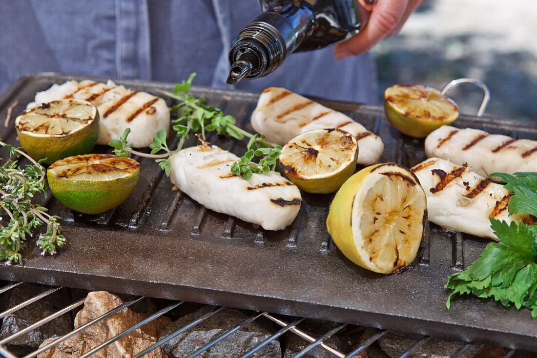 Cod fillets cooked on the barbecue