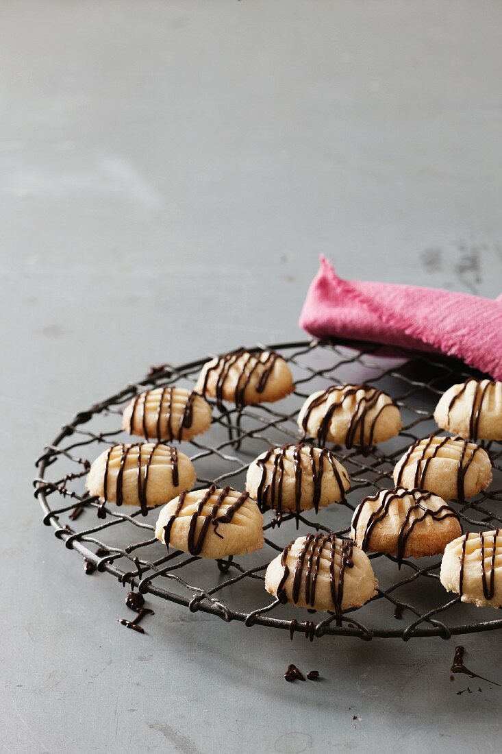 Shortbread with chocolate glaze on a cooling rack