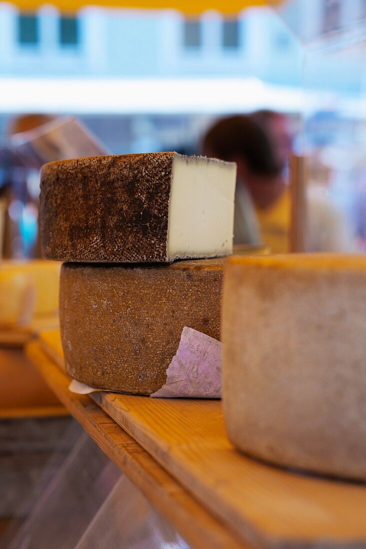 Hard cheese on a market stall