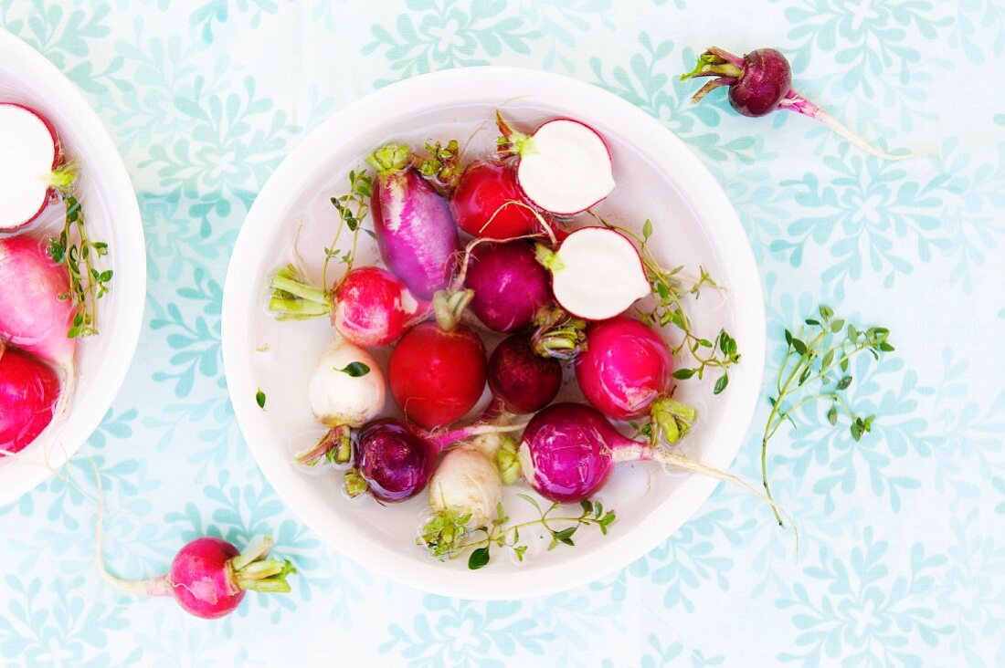 A Variety of Radish Types in a White Bowl