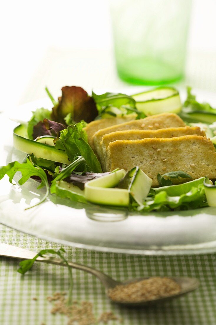 Fried tofu on a bed of salad