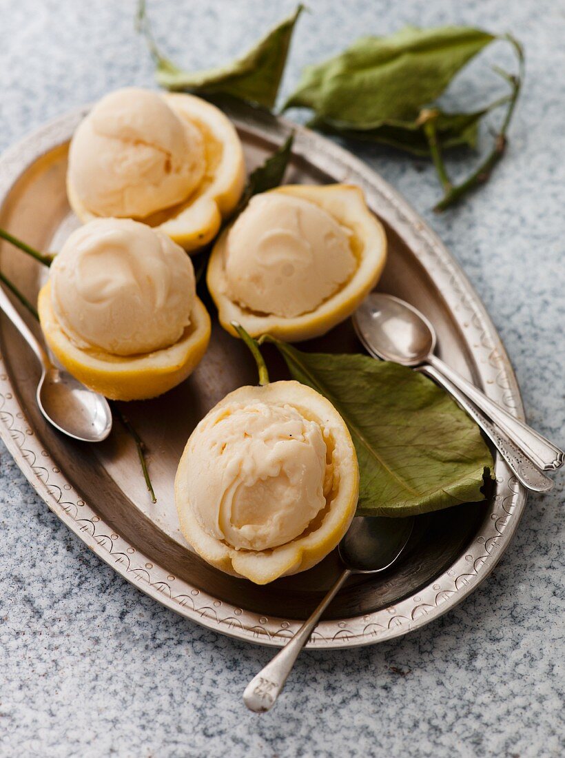 Lemon curd ice cream in hollowed-out lemon halves