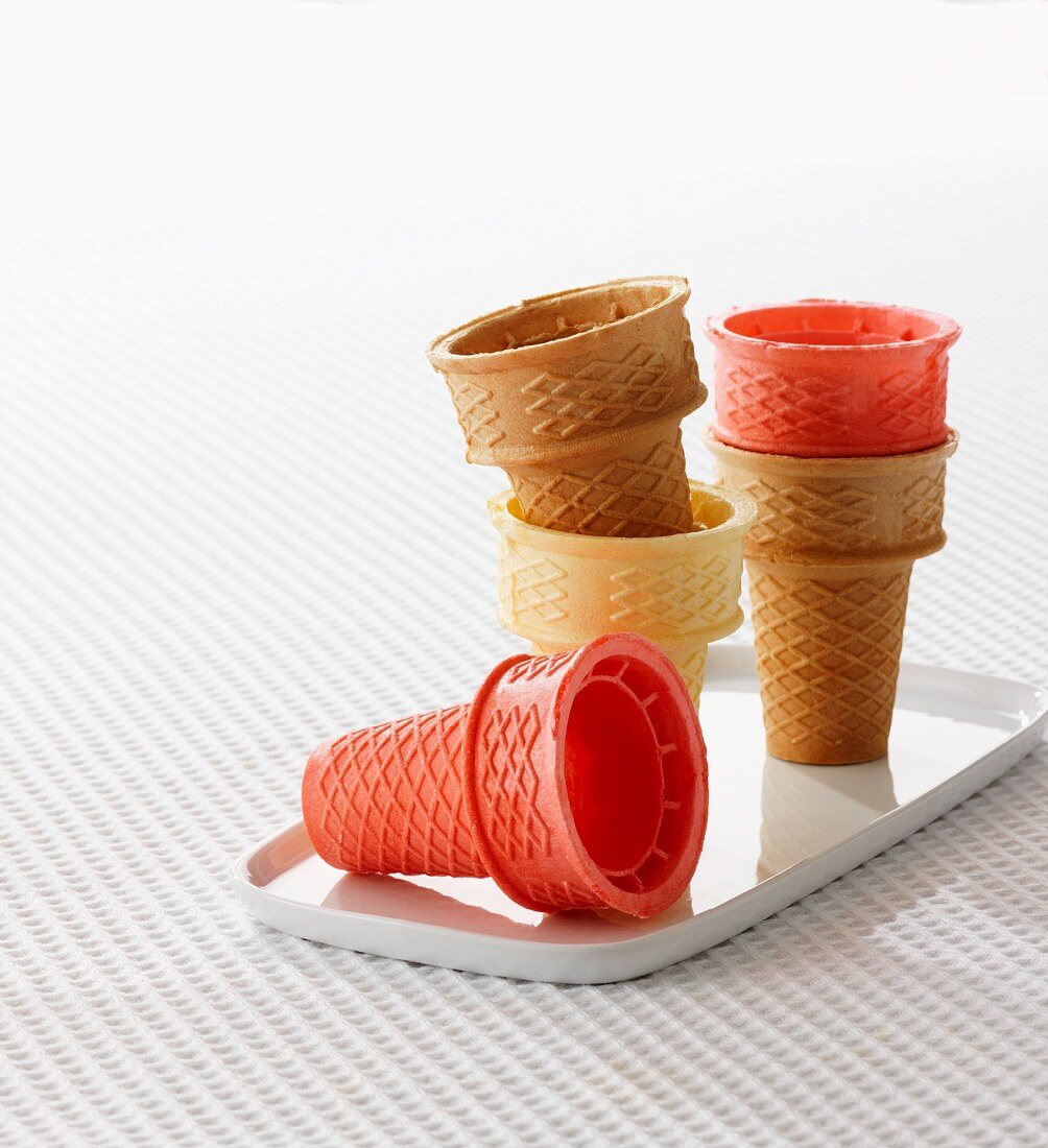 Empty ice-cream cones in assorted colours