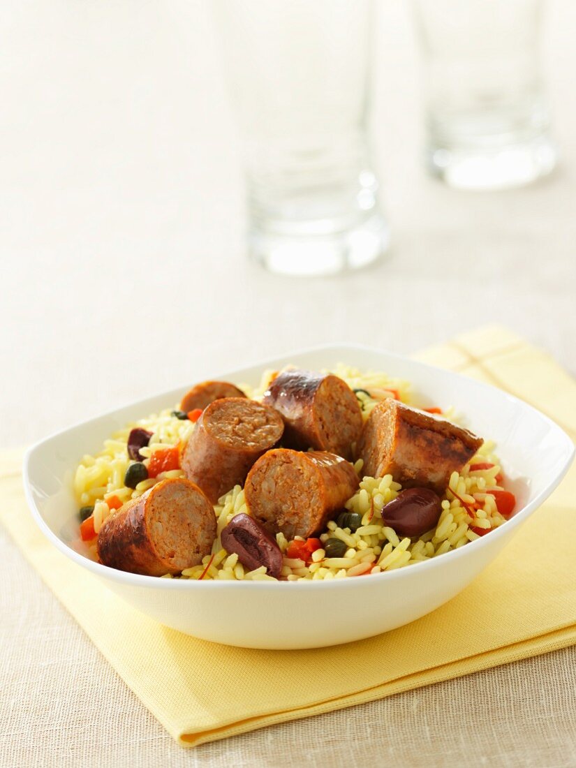 Rice with bratwurst sausages