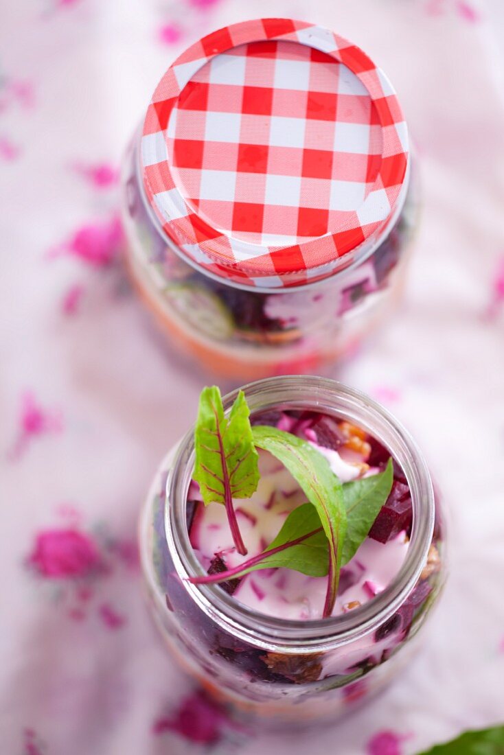 Salad ingredients layered in a jar