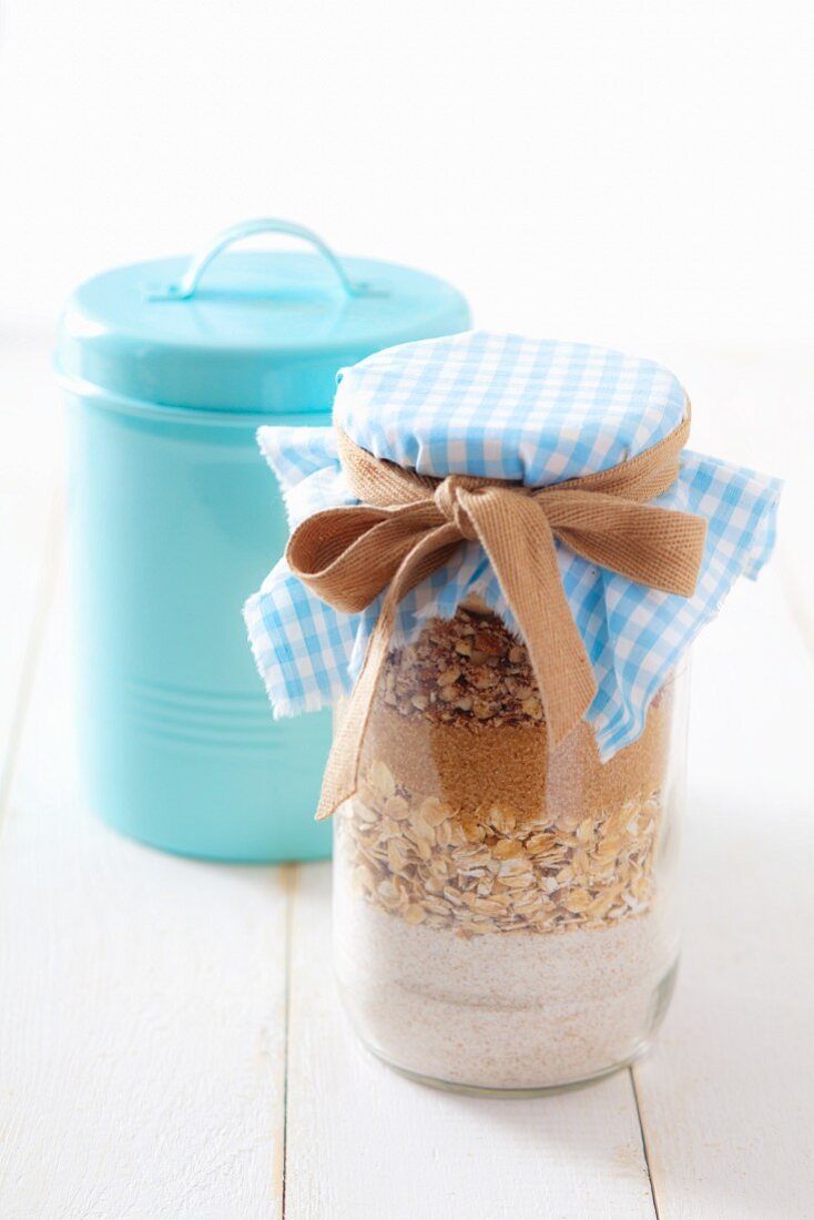Dry ingredients for making oat biscuits, in a jar