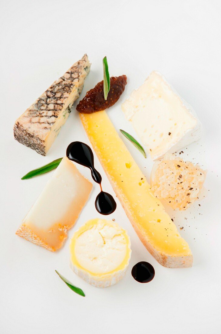A cheese plate with fig chutney, honeycomb and balsamic vinegar