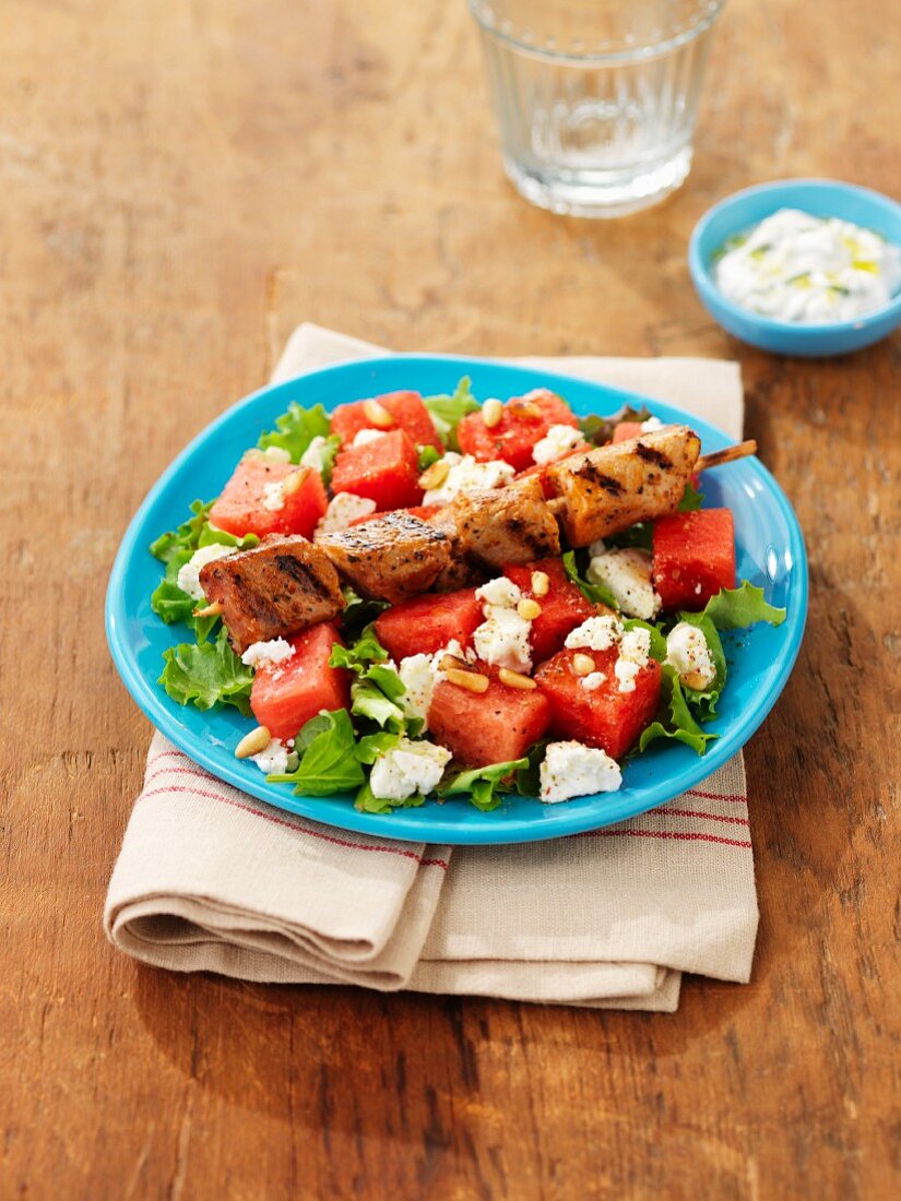 Greek salad with a lamb kebab