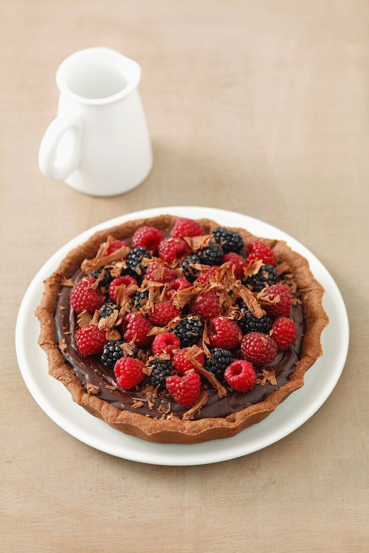 Chocolate torte with fresh raspberries and blackberries