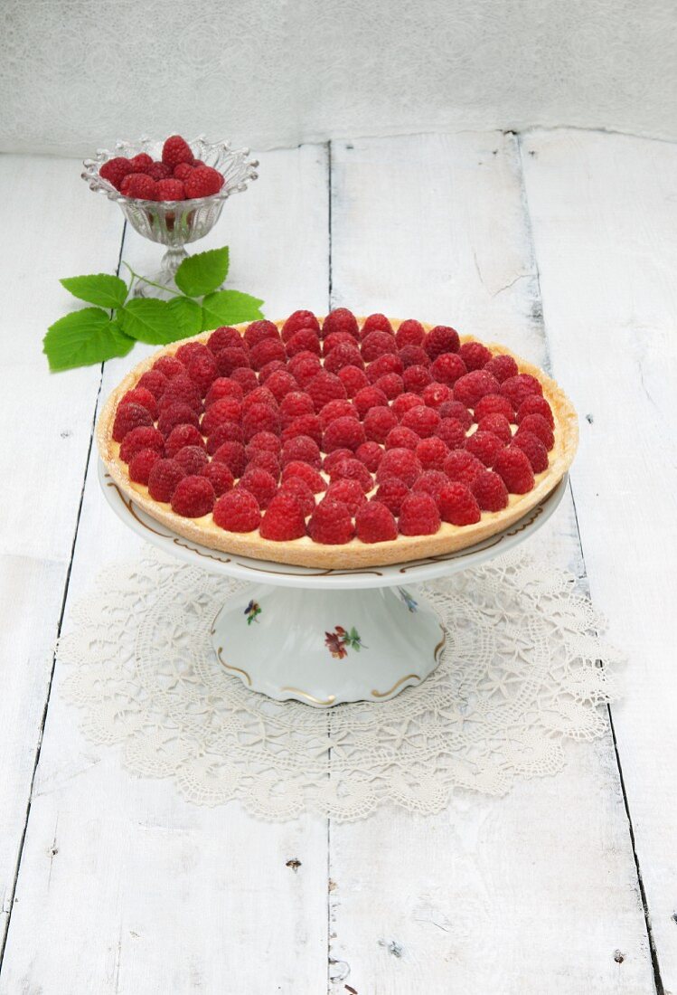 Raspberry tart on a wooden surface