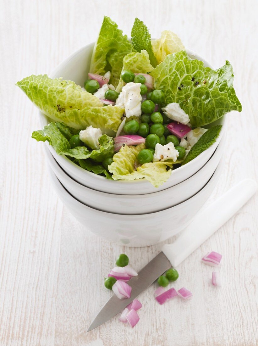 Romaine lettuce with peas and feta