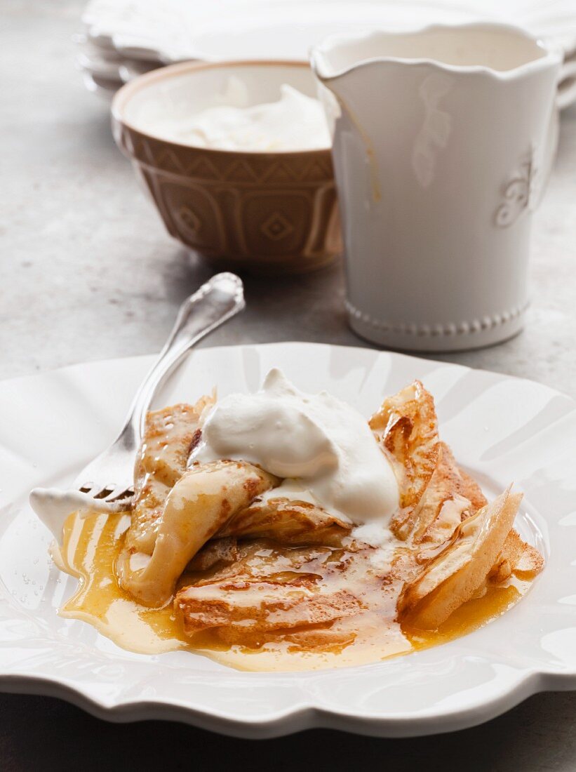 Crepes Suzette with whipped cream