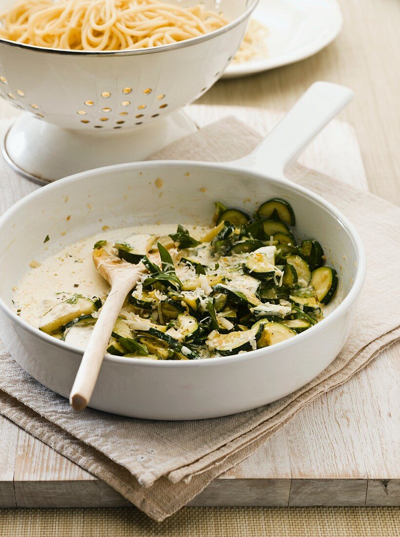 Courgettes with basil as a sauce for spaghetti
