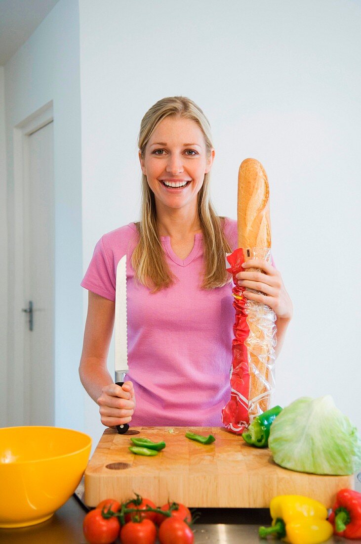 Young woman with baguette