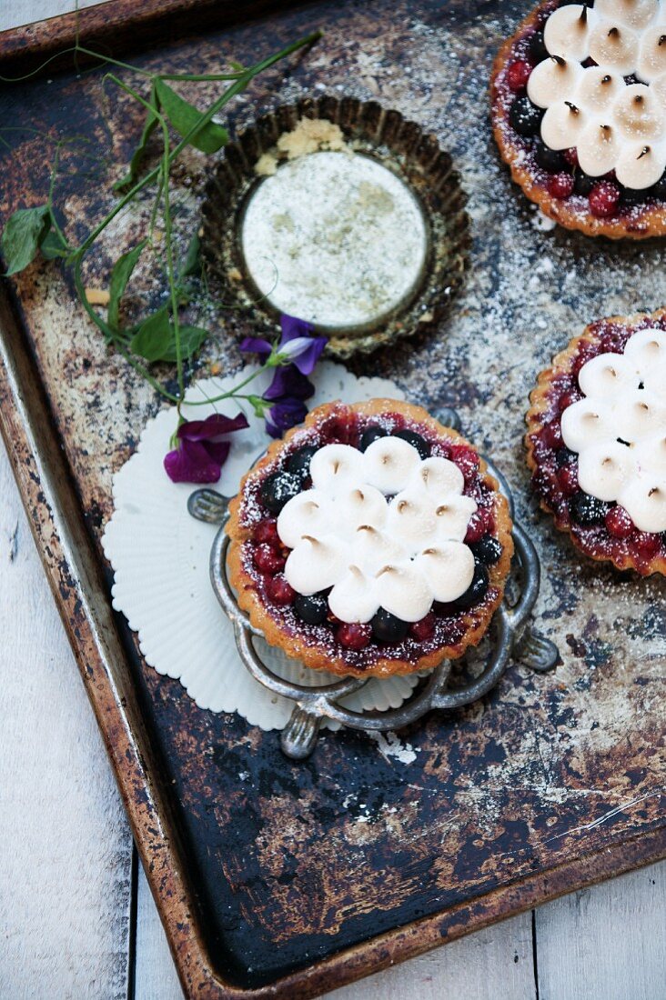 Berry tarts with meringue topping