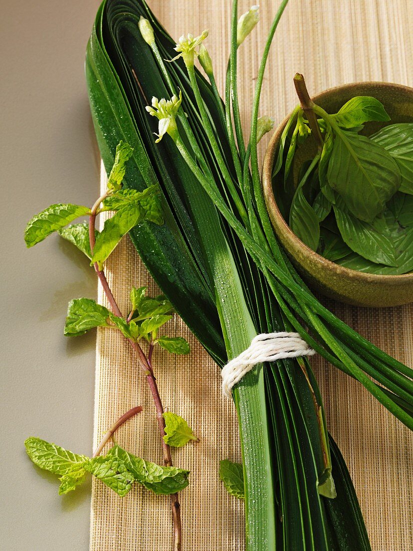 Fresh herbs on a wooden board