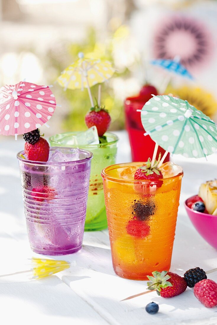 Summery drinks with cocktail umbrellas