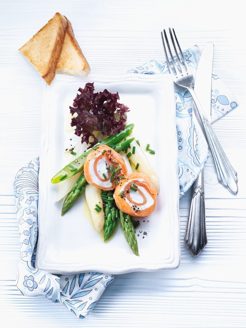 Smoked salmon and cream cheese roulade with asparagus