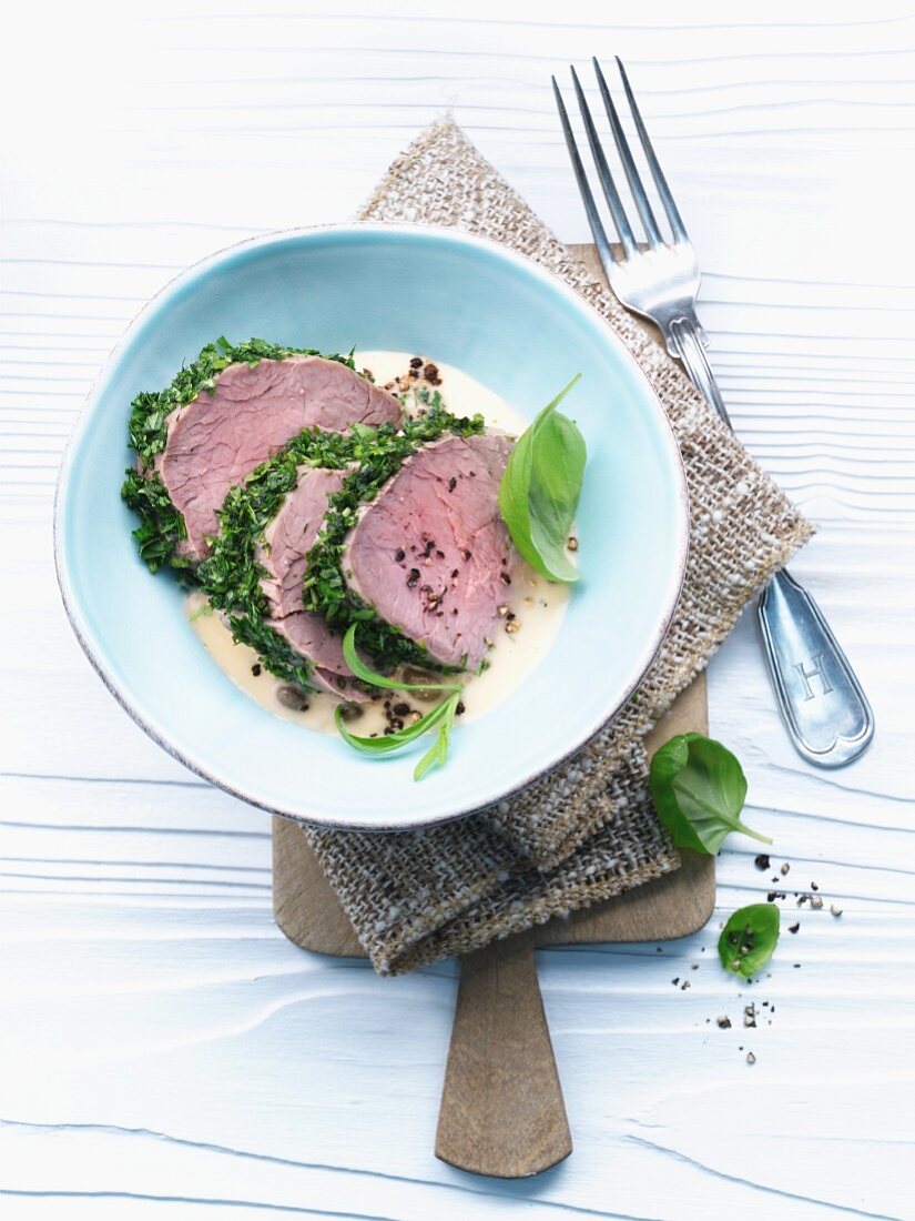 Veal fillet coated in herbs