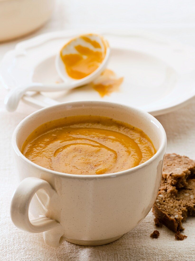 Butternut squash soup in a soup mug