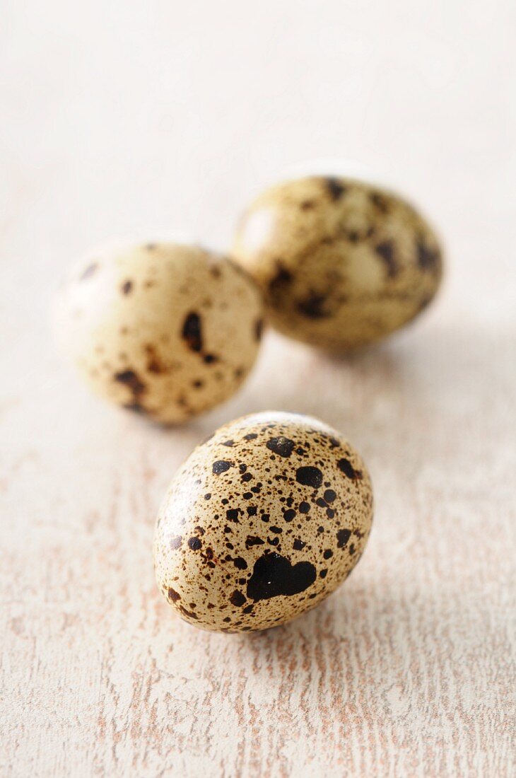 Three quails' eggs